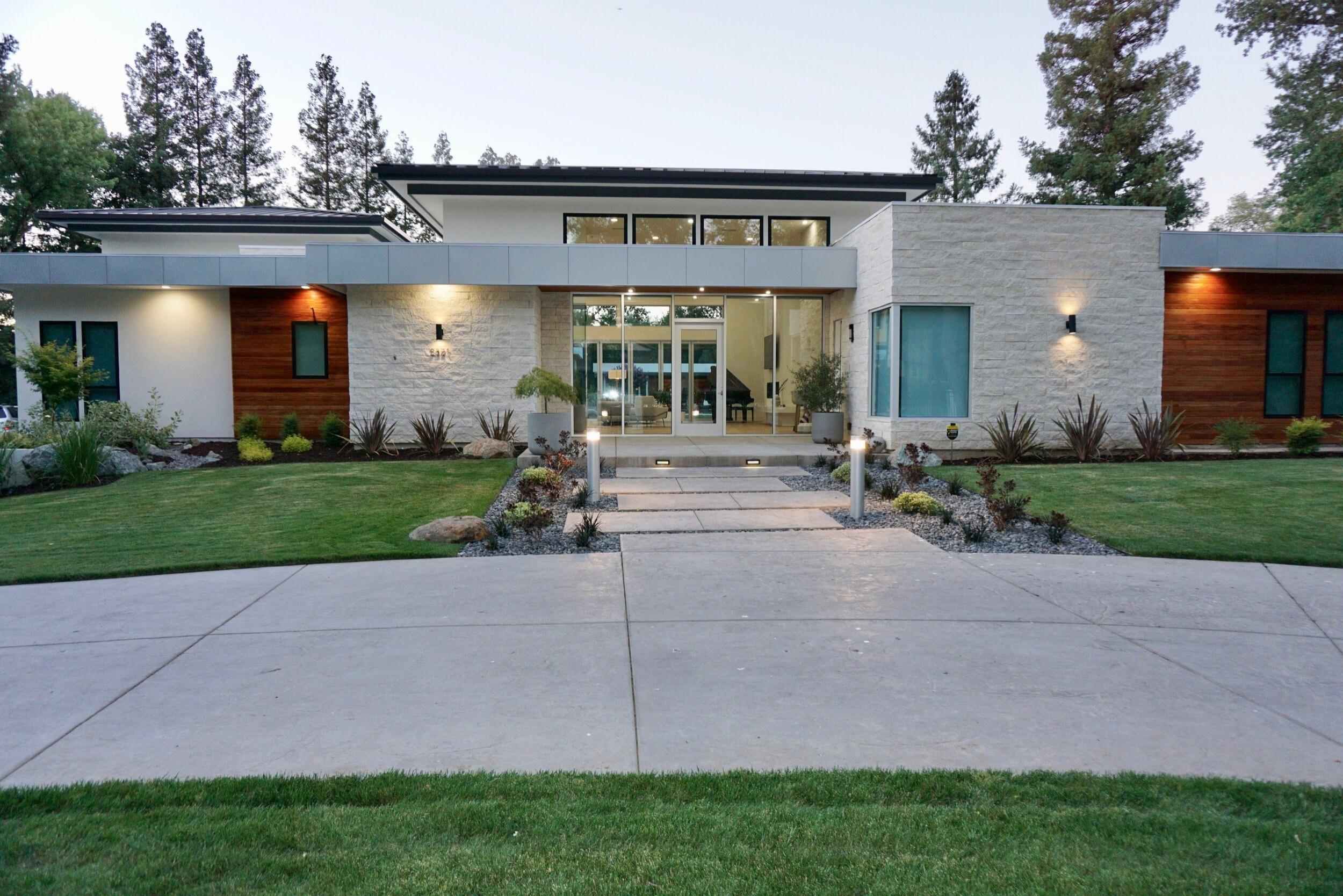 Completed Arden Project with landscaped entry and illuminated interiors